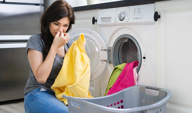 Dấu hiệu máy giặt quá tải - Quần Áo Không Được Giặt Sạch