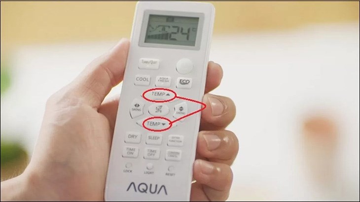 Bạn cần nhấn đồng thời hai nút Tăng và Giảm nhiệt độ để mở khóa điều khiển 
